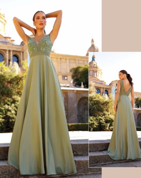 Traje de fiesta con cuerpo de encaje y espalda en pico