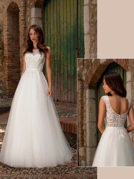 Traje de novia corte princesa con detalles en encajes y brillos
